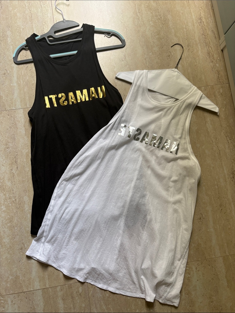 LuluLemon set of 2 open back Black & White 'NAMASTE' Metallic Tank Tops